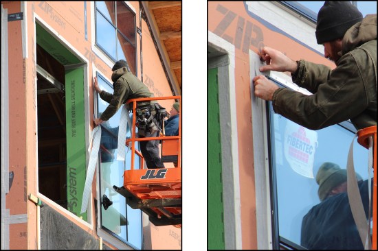 After the Siga sill flashing tape is installed, tape is applied over the open corners (similar to photo below at right). Then the Siga jamb flashing tape is applied (above left). The top inch of the tape is peeled back and the tape worked down the window to adhere it a few inches at a time. The jamb tape is lapped onto the sill flashing tape. After the jamb flashing strips are installed, pieces of the tape are applied at the “open corners” at the top of the window unit on both sides (above right).
