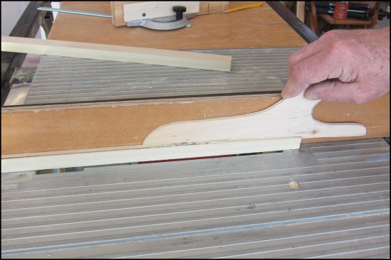 Small and thin work pieces tend to ride up and chatter, making a modified design with an extended hold-down surface essential. Bare fingers can't do this.