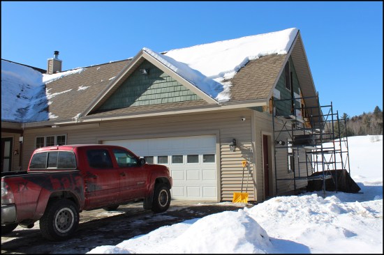 This circa-2006 L-shaped Cape with a bonus room above the garage had a history of ice damming, not only in the valley but also around the entire perimeter of the garage roof.