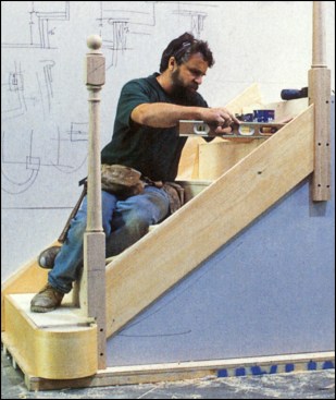 Figure 6: To scribe the face skirt, the author uses a level to mark true plumb and level cuts for each sub-riser and sub-tread.