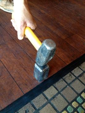I welded a plate on the other end so that I could drive it with a hammer.