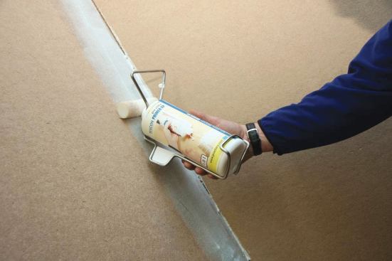 Some flashing manufacturers require an adhesive primer on certain substrates, the most common being gypsum sheathing, masonry, and the rough side of OSB. Primers come in spray-on and brush-on varieties.