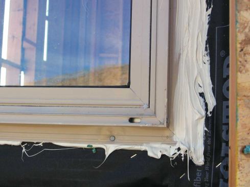 Certain caulks and sealants may be incompatible with particular flexible flashings. Silicone products, as shown here, should not be used with any type of flexible flashing.
