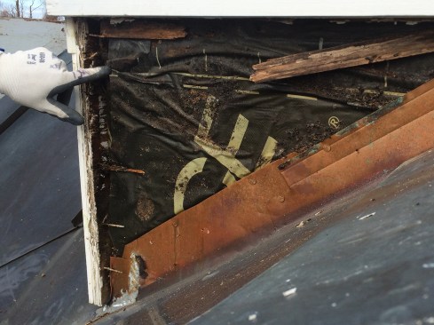 Another red flag was that sheathing behind the peel-and-stick at the top of the base felt spongy, prompting us to demo the upper portion of the cupola.