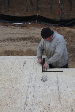 For walls 2 feet long or shorter, a framing square can be used to mark a line more quickly and easily than snapping a line.