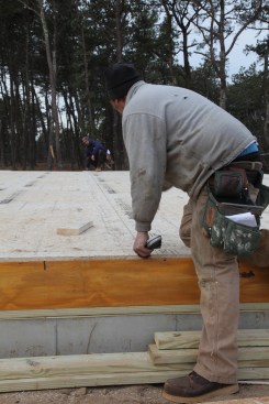 The bearing wall near the middle of the house is snapped last. The far end aligned with the last short jog that was measured, so that same distance was marked on the other end of the house. A line was then snapped between the marks. All in all, the entire layout process took less than 30 minutes.