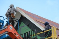 The entire cornice return will be capped with stainless steel. The cornice detail continues up the rakes, and the crown pieces meet at the peak with a perfect miter.