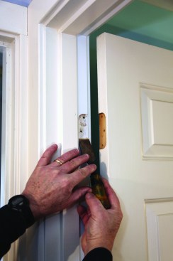 A better method, which doesn’t distort the hinge, is removing the hinge and shaving a tiny bit off the mortise with a sharp chisel. Often, the mortise on only one side of the hinge needs to be shaved.