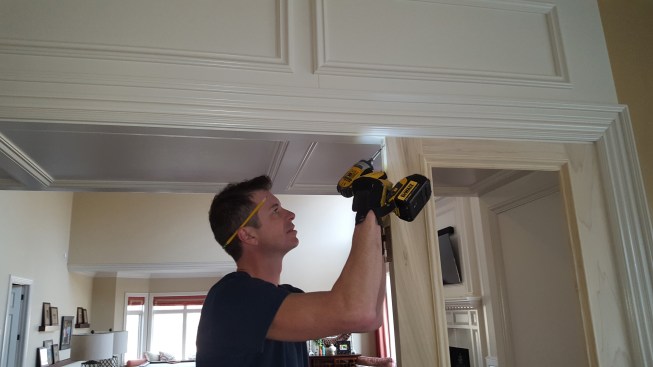 The stationary panels screw to the jamb and to the top free corner.