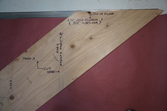 At the top of the stair, draw in the finished flooring and check the unit rise dimension to the top of the tread on the first step. At the top it's also a good idea to draw in the material you'll use for hanging the stringers.