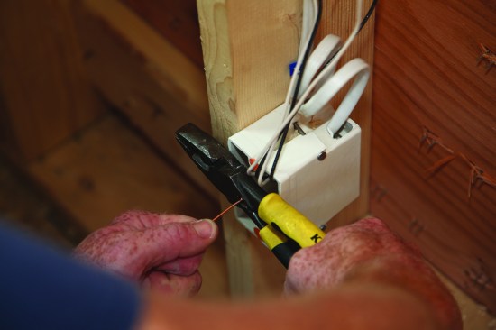 To secure the junction, slide a copper sleeve onto the twisted conductors and crimp the junction with pliers