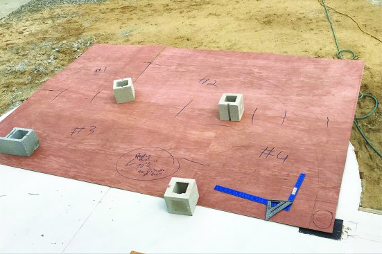 The porch columns would attach to the metal plates embedded in the slab.