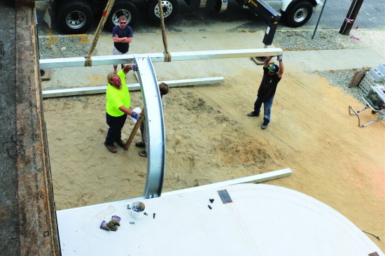 After finishing the remainder of the prep work, the fabricator brought the metal parts back to the site for assembly.
