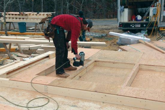 Some framers prefer to cut out the openings by sawing along snapped chalk lines. The cut-out openings then provide easy access for nailing off the perimeter. Typically, the edges of the sheets and the opening perimeters are nailed 4 inches on-center, while nails along the studs are driven every 6 inches. Most jurisdictions require 6d ring-shank nails or 8d common nails for attaching sheathing.