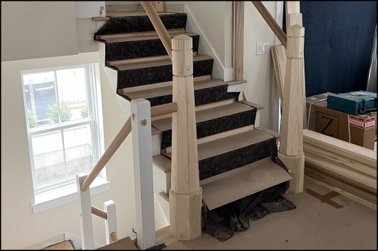 The retrofit glued-in bases provide a stiff newel–rail assembly.