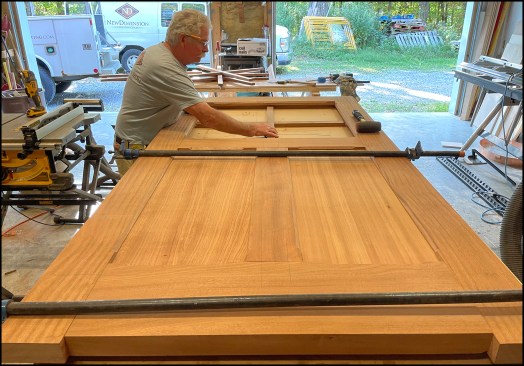 The new, oversized, 2 1/4-inch-thick doors were built in the shop using the same tools and techniques as a used to build standard 1 3/4-inch doors on site. (Due to the unwieldy size and weight of the doors—48-inch-wide-by-90-inch-high doors made from 12/4-thick sapele—the author decided to build the doors in his shop with help from a crew member).