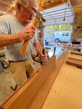 Here, three mortises are cut in a staggered pattern rather than in line to strengthen each side of the thick door.