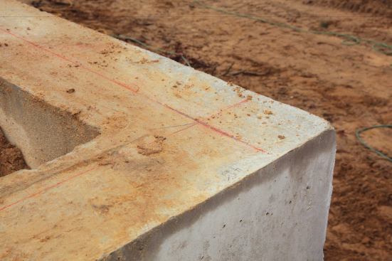 But with a mobile-phone app or a construction calculator, you can simply enter the exact measurement of both walls, and the program gives you the diagonal measurement. On this foundation, the diagonals were off by only 1/4 inch—a pretty small amount in the scheme of things. Nevertheless, we corrected by shifting the back corner slightly, then double-checked our diagonals until they were perfect.