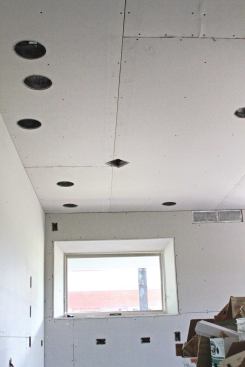 The cutouts for every switch, outlet, and light fixture need to be sealed before the drywall is hung.

