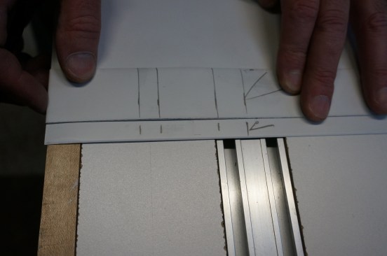 Then hook the strip over the stock to transfer the marks.