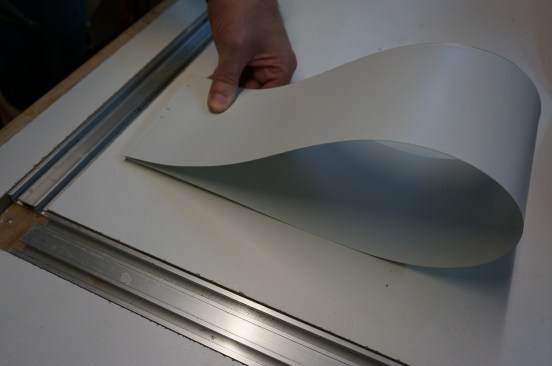 Mark the dimensions on one end of the stock and then fold the piece over on itself to transfer the dimensions to the other end.