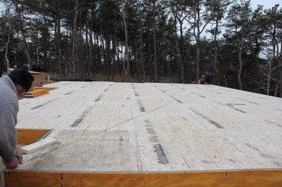 Measure diagonal distance between the corner on the baseline wall and the approximate corner on the parallel wall.