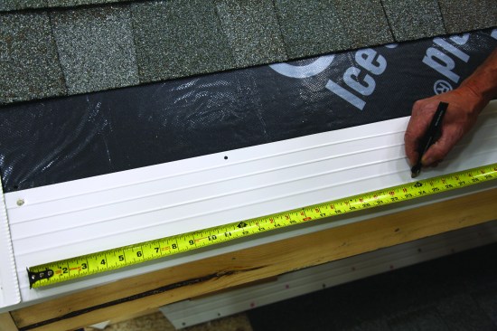Code requires that the drip edge extend at least 2 inches onto the roof from the fascia board. This drip edge extends much farther. Nailing along the eaves should be spaced at no more than 12 inches on-center.