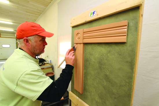 He continues with the jamb casing, and finishing with the sill and apron.