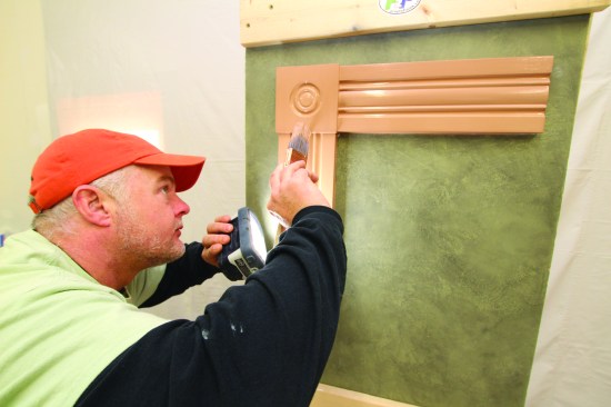 While the paint is still wet, he sights every surface with a hand-held
LED light, and corrects any problems before the paint begins to dry.