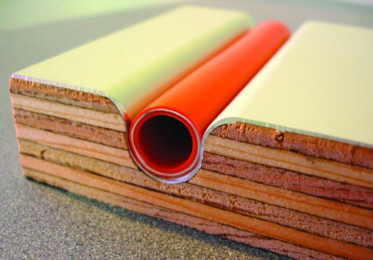 WarmBoard comes in two panel types; WarmBoard-S is a 1 1/8-inch-thick structural plywood subfloor that doubles as the radiant panel.