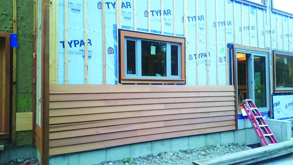 Closed vs. open rainscreen. Wood clapboards are an example of a closed rainscreen system, where each layer of cladding laps over the layer below.