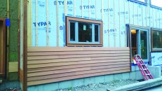 Closed vs. open rainscreen. Wood clapboards are an example of a closed rainscreen system, where each layer of cladding laps over the layer below.