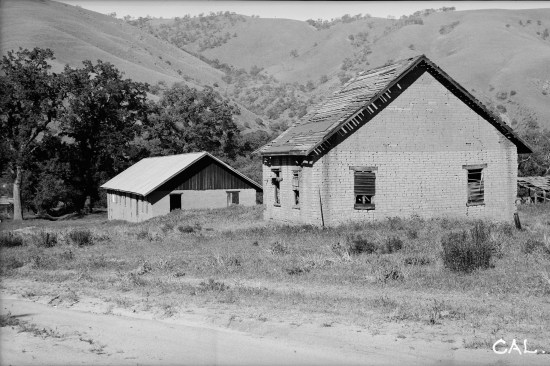 The First U.S. Dragoons (mounted infantry) arrived on August 10, 1854 and began construction on roughly 40 military buildings. The fort’s purpose was to guard the Grapevine Pass through the Tehachapi Mountains at Lebec, Kern County, Calif. The remaining south end of Barracks Building #2 and the largely intact Barracks Building #1 shown in the background, viewed from the south.