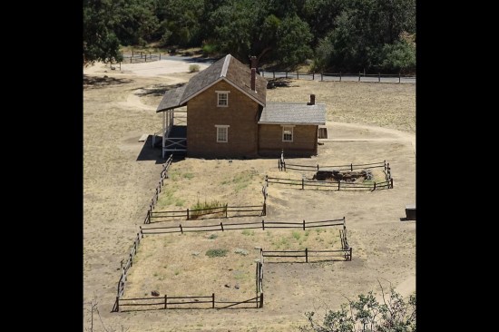 Reconstructed Officers’ Quarters as viewed from the west. Split rail fencing denotes footprint of the previously standing Officers’ Quarters adjacent to the reconstructed structure.