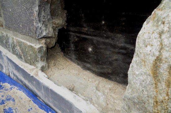 The roof counterflashing was inserted into the face of the stone about 1/2 inch.