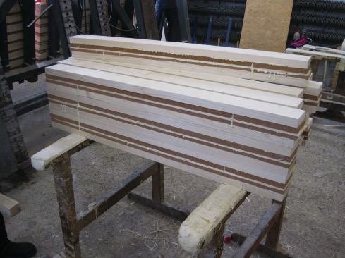 Layers of cork replace the wood in the blank to add a thermal break to the wood frame.