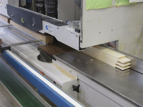 Each blank is sent into a machine that creates the profile of the frame as well as the corner glue joints.