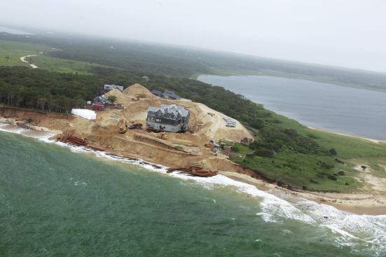 Much of the 14-acre site was excavated to create staging areas and working room around four structures.