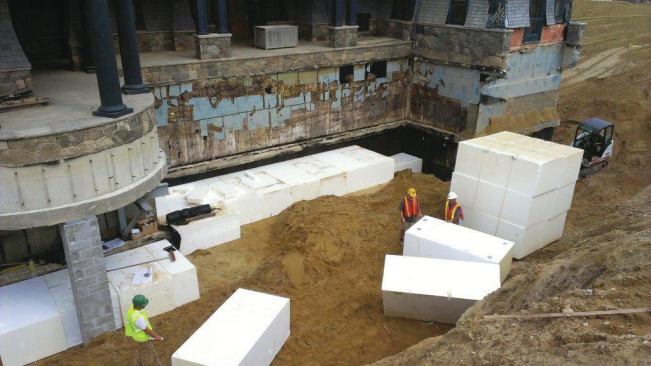 To reduce lateral soil pressure on the block sub-basement, 4x4x8-foot blocks of EPS were fitted around the perimeter before being fixed in position by backfilled soil.