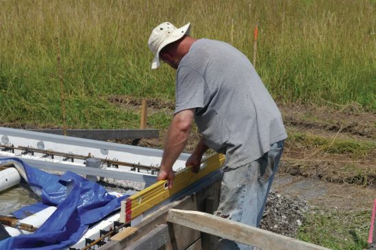Then we capped it with 2 1/2-inch lightweight channel to make screeding easier.