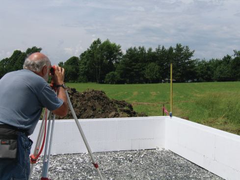 Unlike the forms for the pool slab, these came completely assembled, so I stacked both courses before shooting elevations ...
