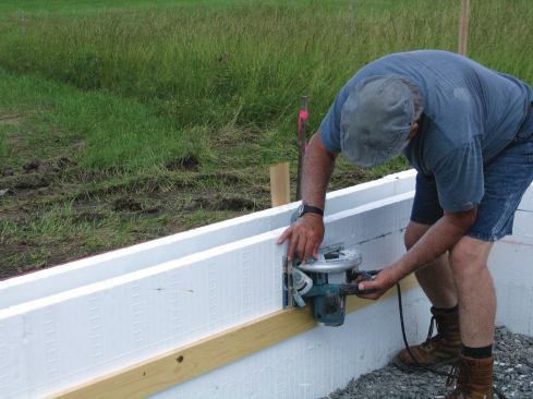 ... and cutting away the inside of the form to create a thickened curb.