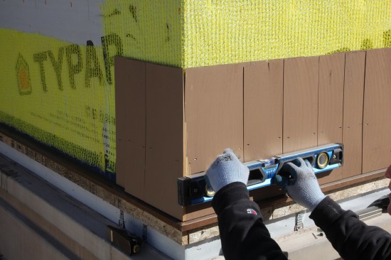 After measuring up for the proper exposure, draw a level line on both sides of the corner to guide the next course.