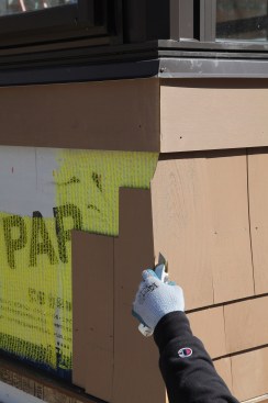 The top courses on this project tucked under a molding. To allow the shingle to be installed and then trimmed in place, the top corner was notched.