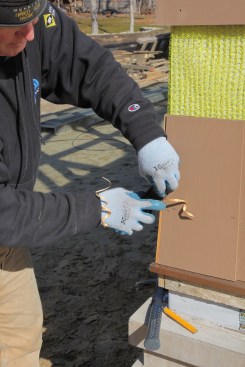 After installing the shingle, smooth the edge with a block plane.