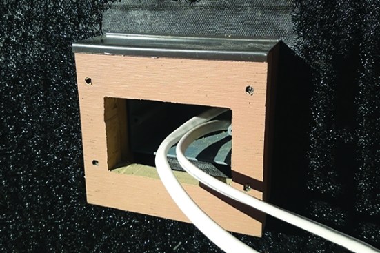 Exterior outlets mount into boxes that are flashed into the drainage plane and the rainscreen mesh.