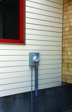 The meter then attaches directly to the siding, keeping the drainage plane intact behind the meter.