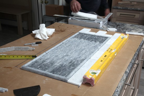 The dry layout of the mural also allows the author to plot the field tile layout from one side of the mural to the other that the tile breaks evenly.