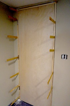 Insert intermediate shims every 12 to 16 inches along both jambs.