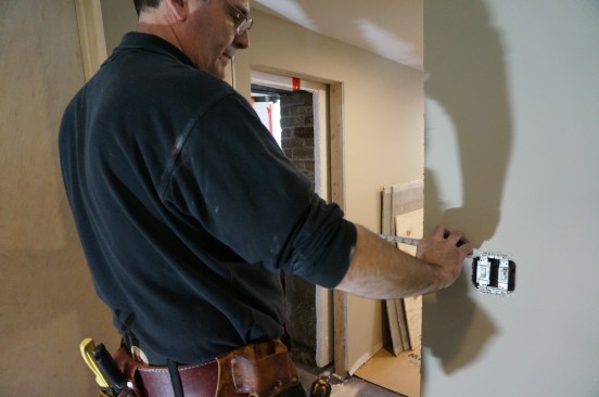 As a final check, measure the width of the opening. It should be the width of the assembly plus 1/2 inch (1/4 inch extra room on either side).